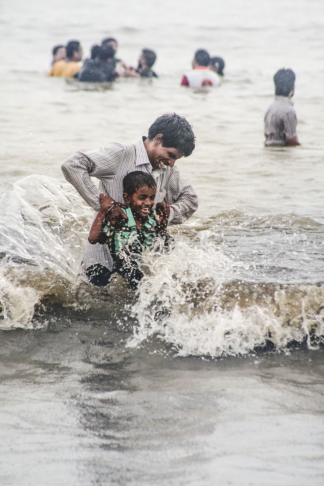 Father and son have a fun day at Chowpatty.
Bombay / Mumbai, India.
